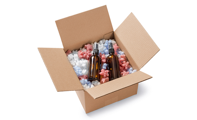Open cardboard box filled with Custom Shape Loose Fill