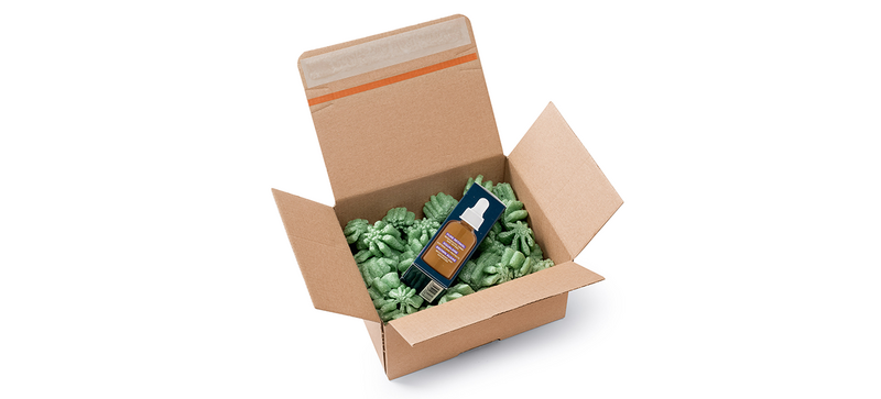 Open cardboard box filled with Custom Shape Loose Fill